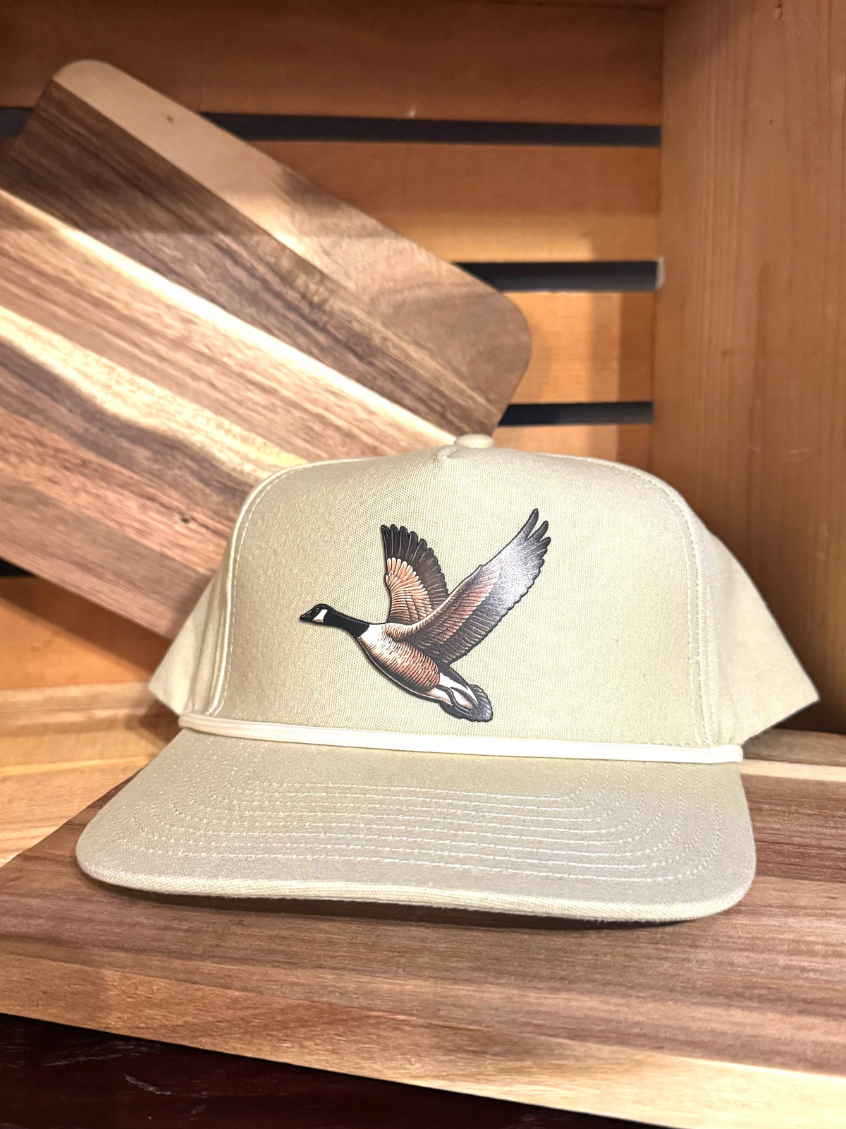Common South khaki rope hat with a Canada goose in flight on the front