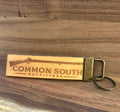 Common South Outfitters leather keychain engraved with a vintage rifle